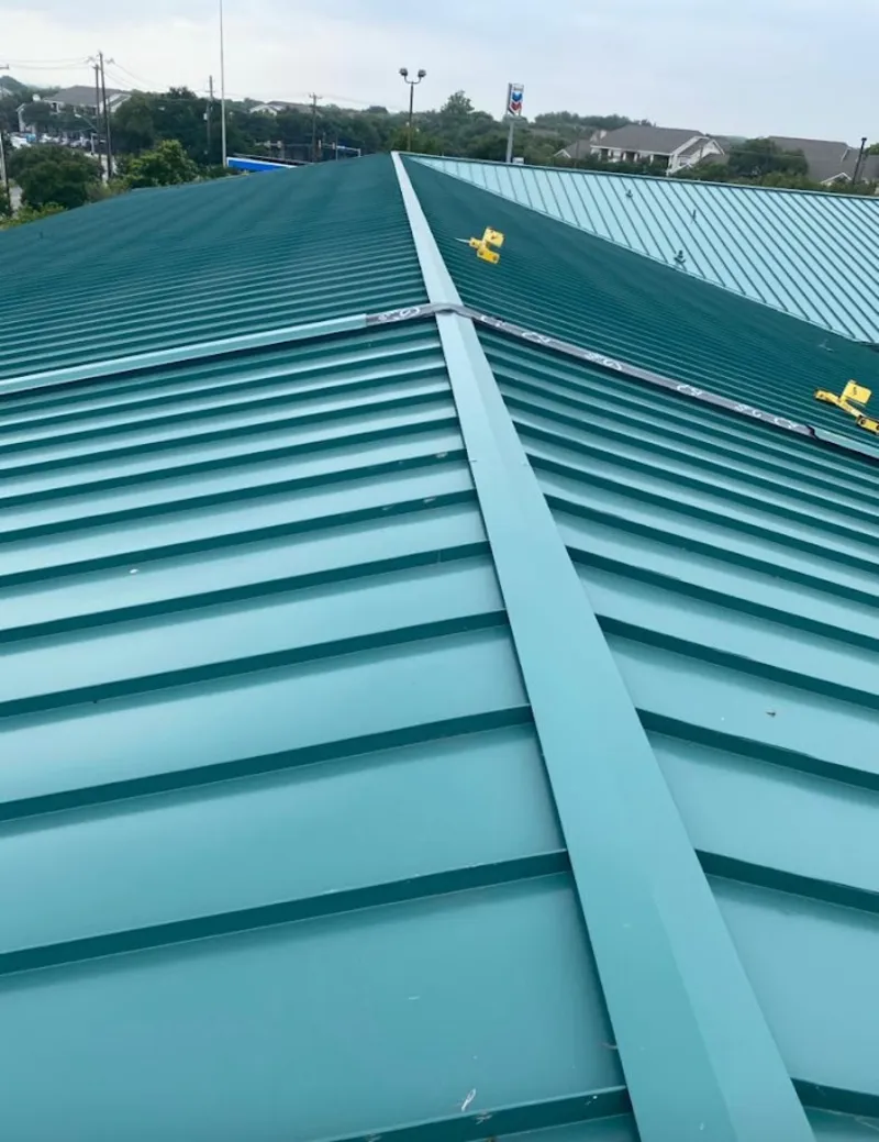 Green commercial metal roof ridge and valley for Metal Roof Repair in Port Jefferson