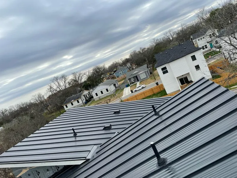 Standing seam metal roof panels with vents for Skylight Repair in Port Jefferson